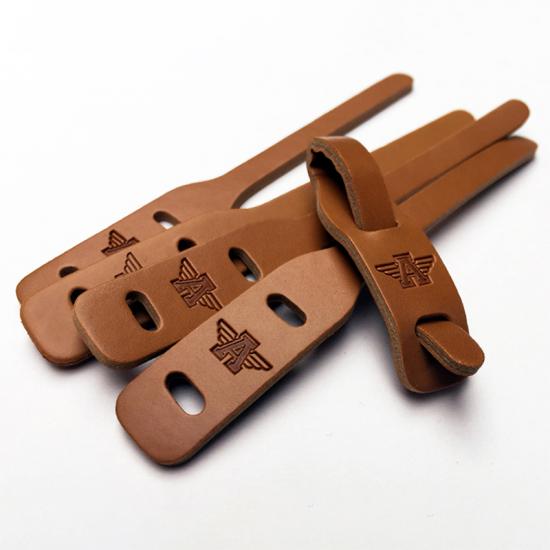 Custom leather zipper pulls for brands